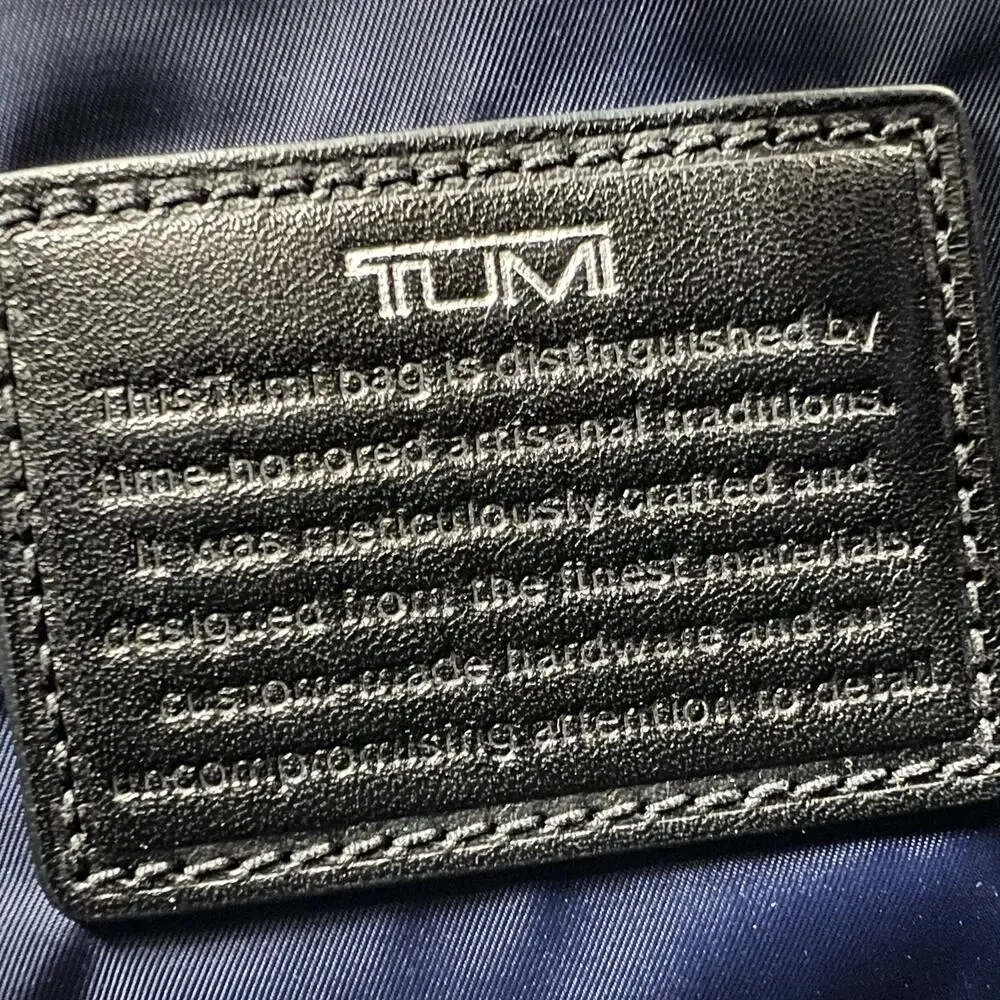 TUMI MCMLXXV Coated Canvas & Leather Top Handle Locking Briefcase Messenger Bag